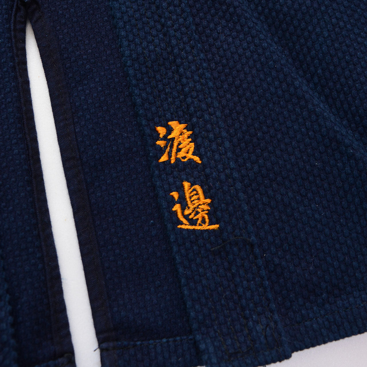 Indigo martial arts jacket, wrap collar, 100% cotton, made in Japan, deadstock