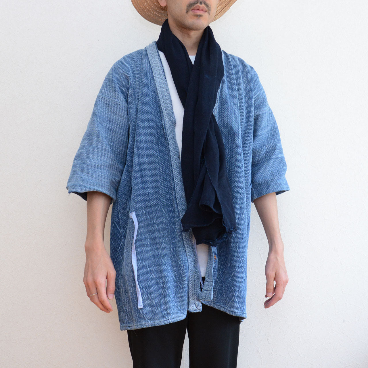 Vintage Bushuichi indigo sashiko kendo jacket with natural fade and wear
