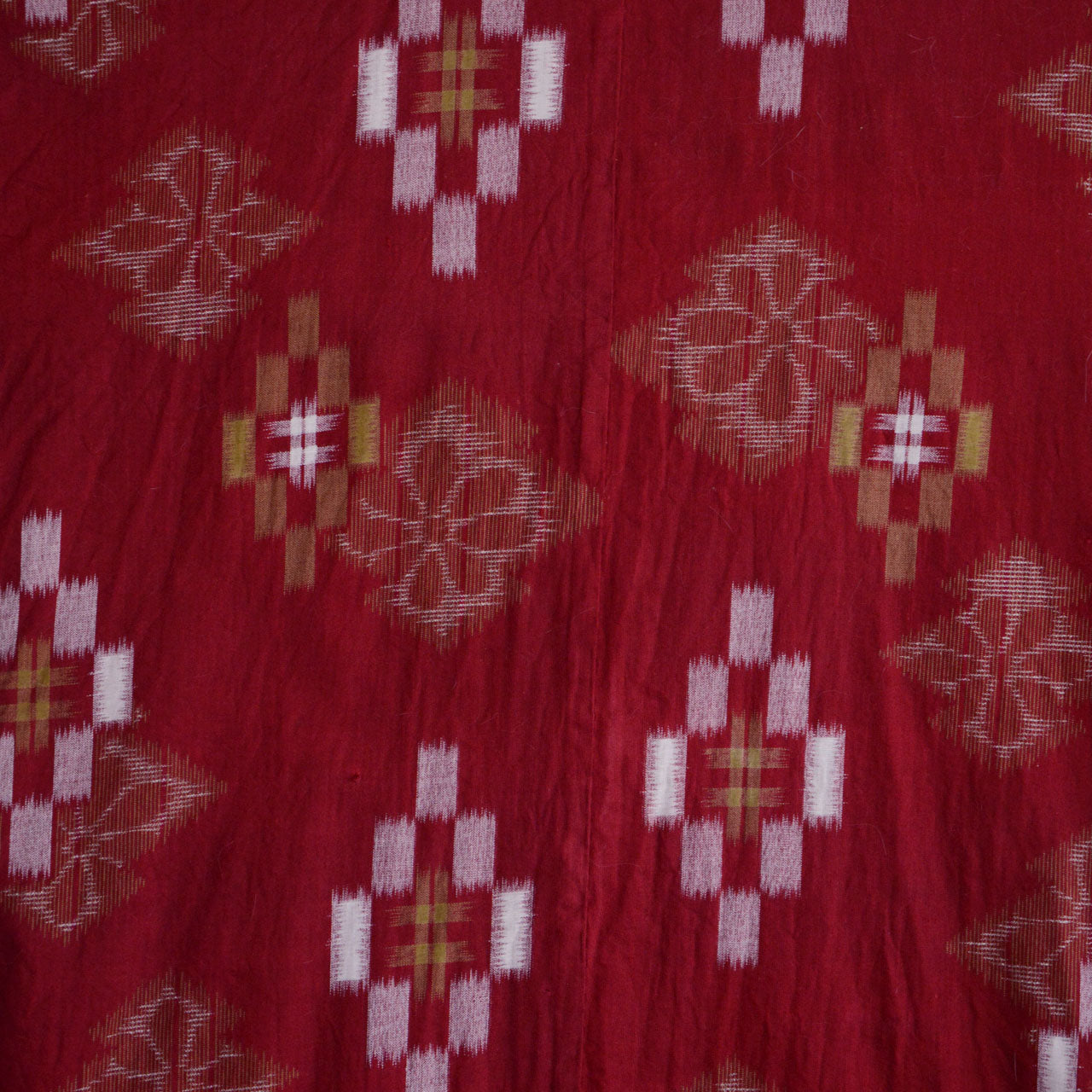 Handmade Japanese kasuri kimono, red cotton ground, ikat weave pattern, Showa period