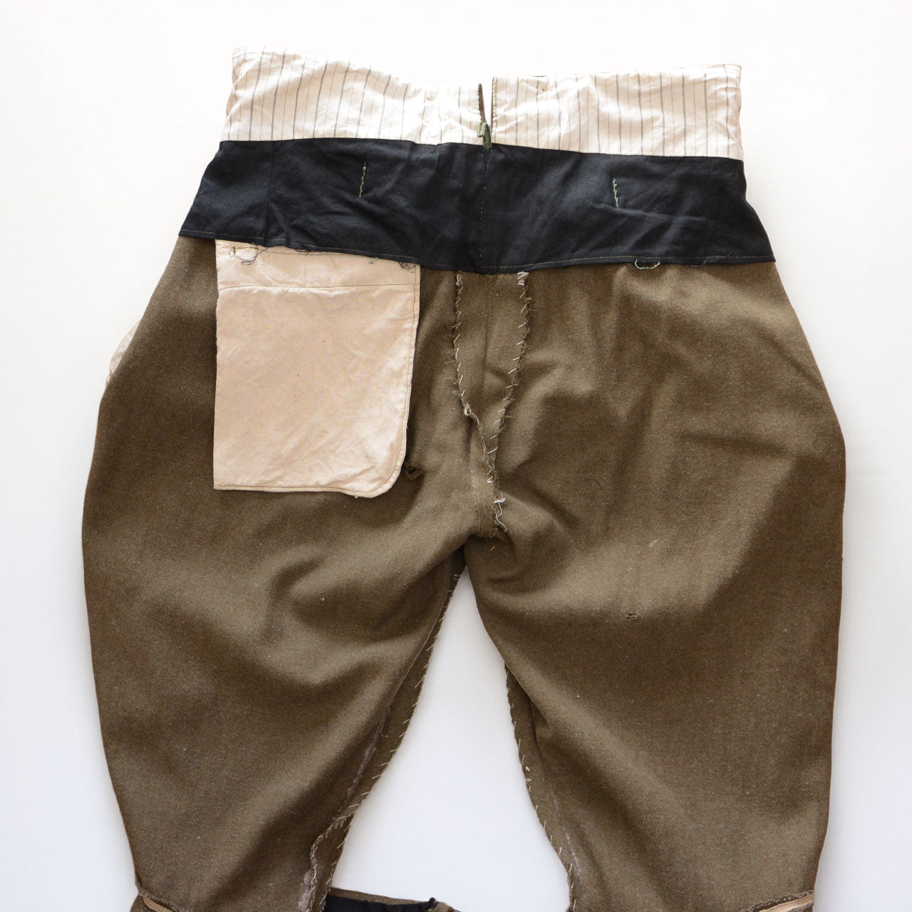 Wool jodhpurs with vintage patina and military detailing
