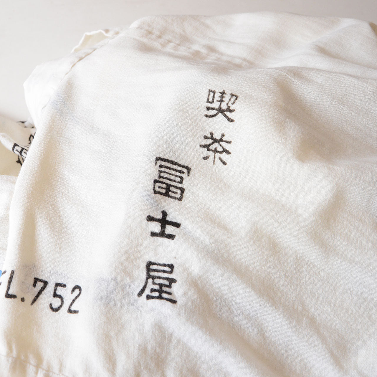 Cultural heritage kimono combining Japanese motifs and cotton textiles