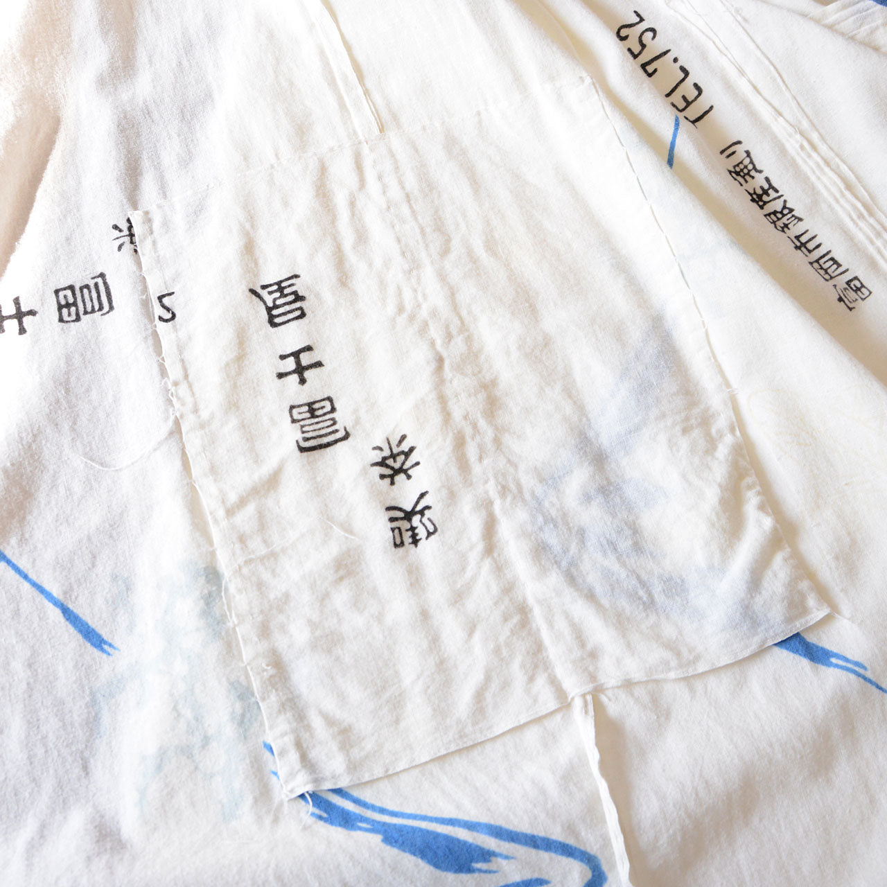 Japanese vintage tenugui patchwork robe with cultural motifs