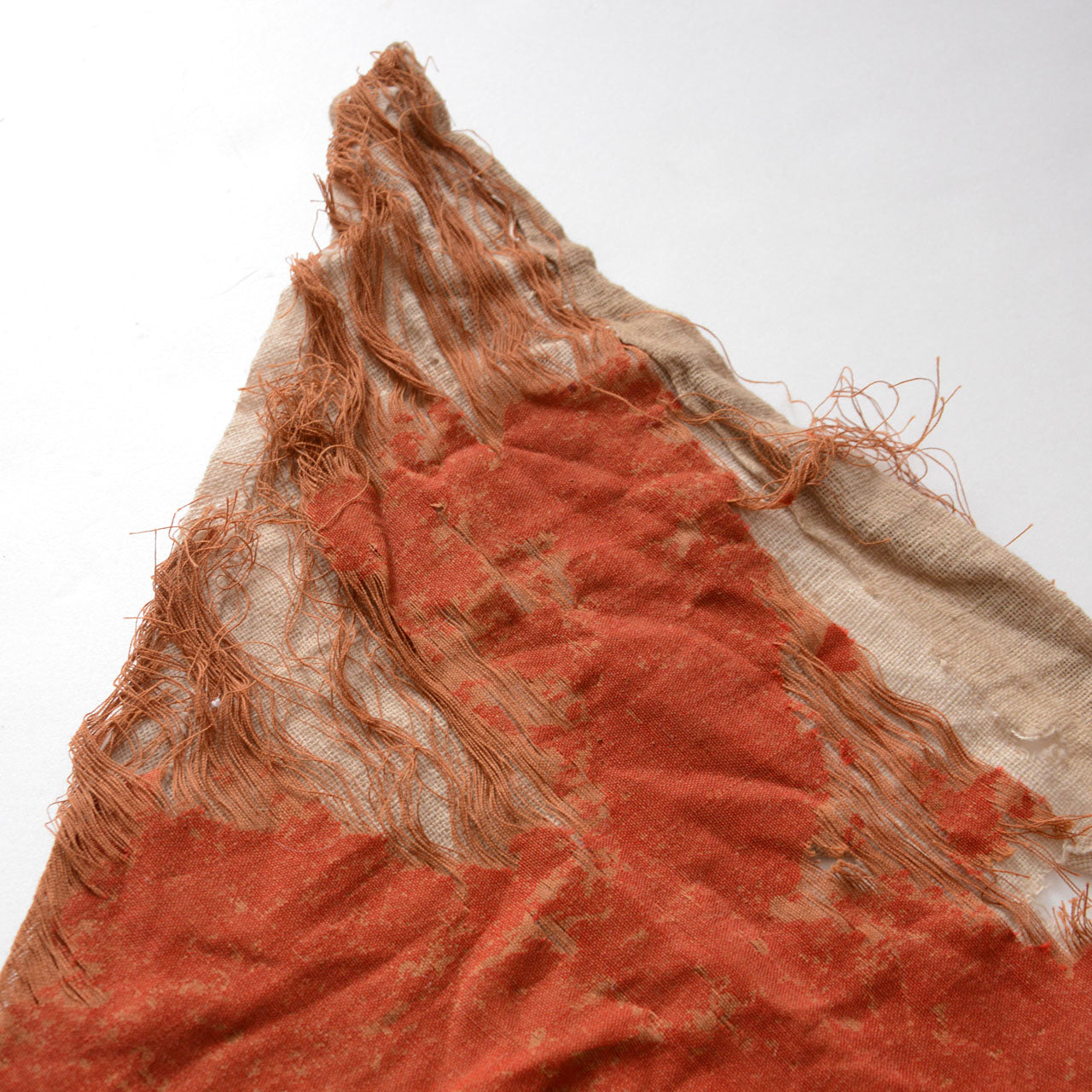 Antique triangular flag with powerful presence and symbolic design elements.