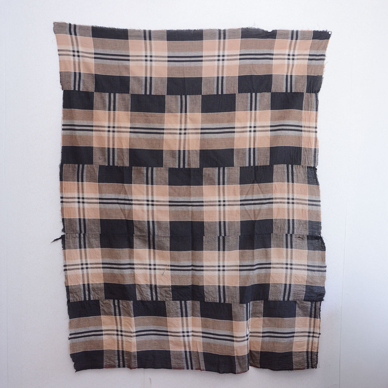 Vintage Japanese cotton check fabric, full view from front, black and camel plaid, Showa era futon toki