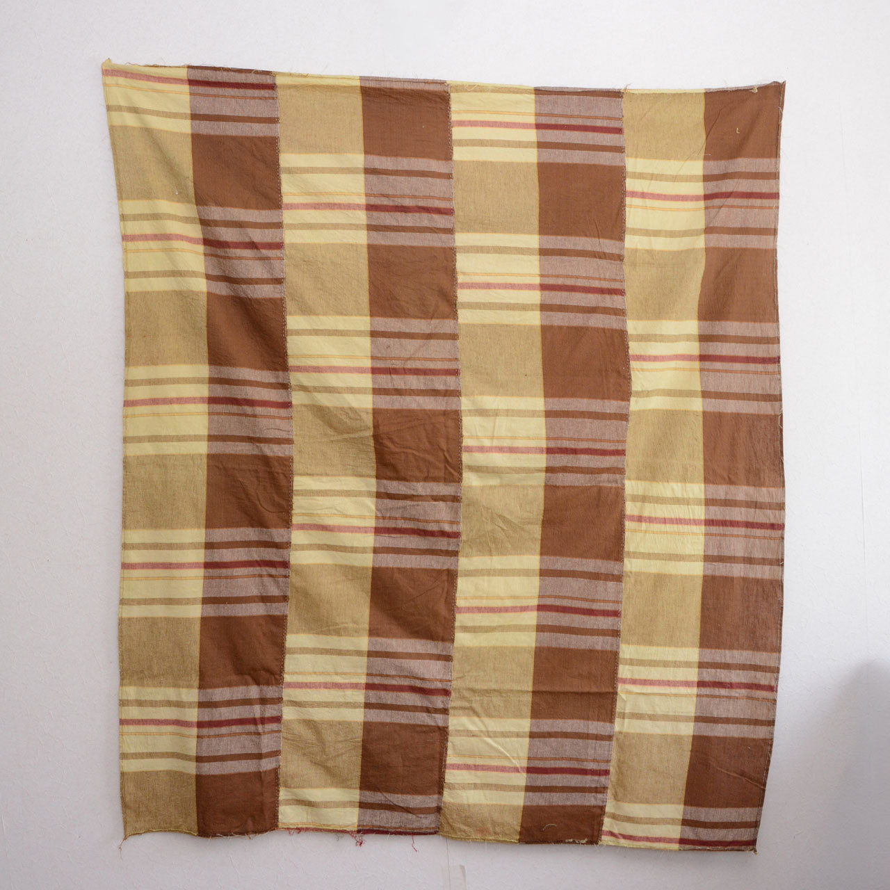 Full back view of vintage Japanese cotton fabric displayed on wall