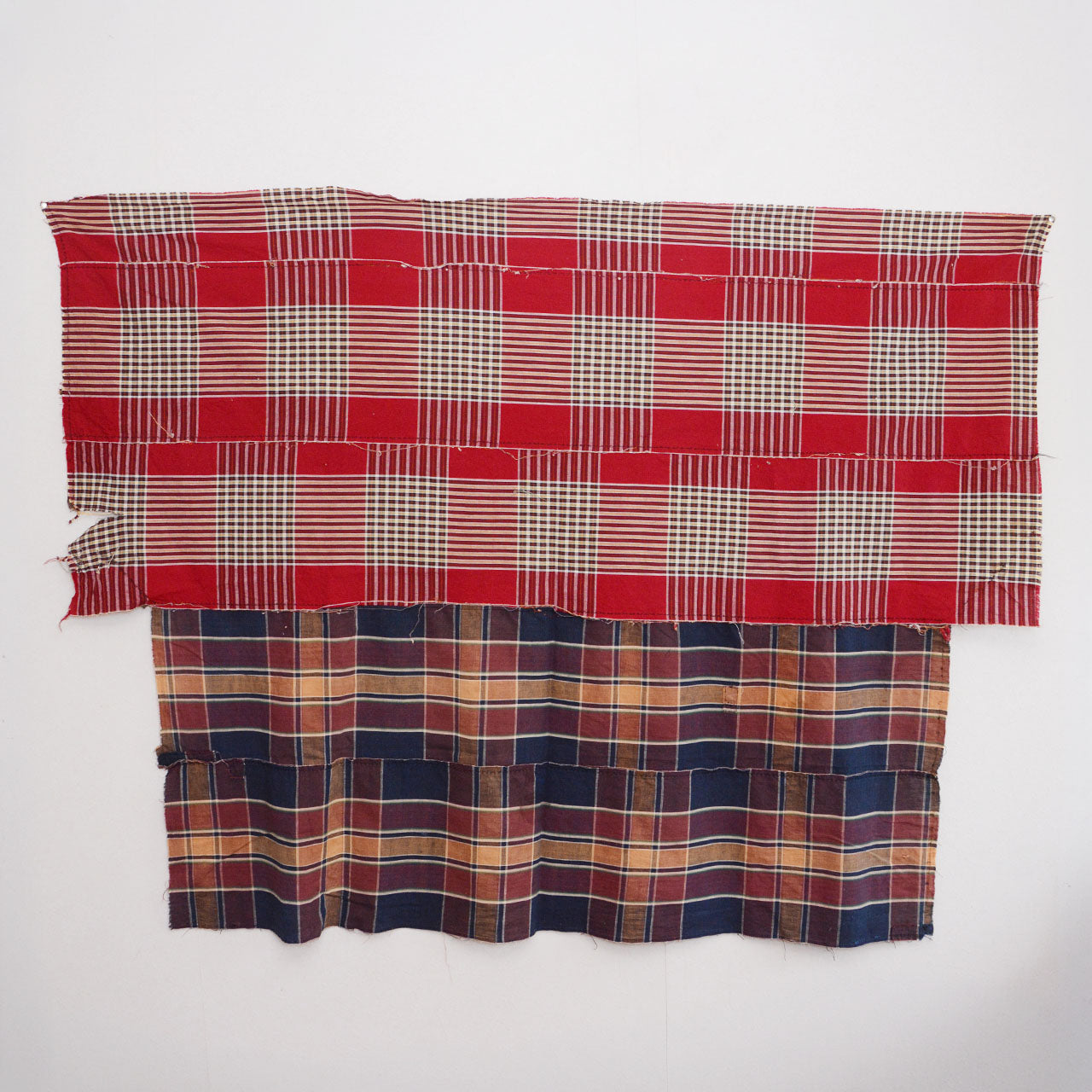 Full back view of vintage Japanese futon cover displayed on wall — reverse side showing cotton construction and aged patina, mid-Showa era Japan vintage fabric