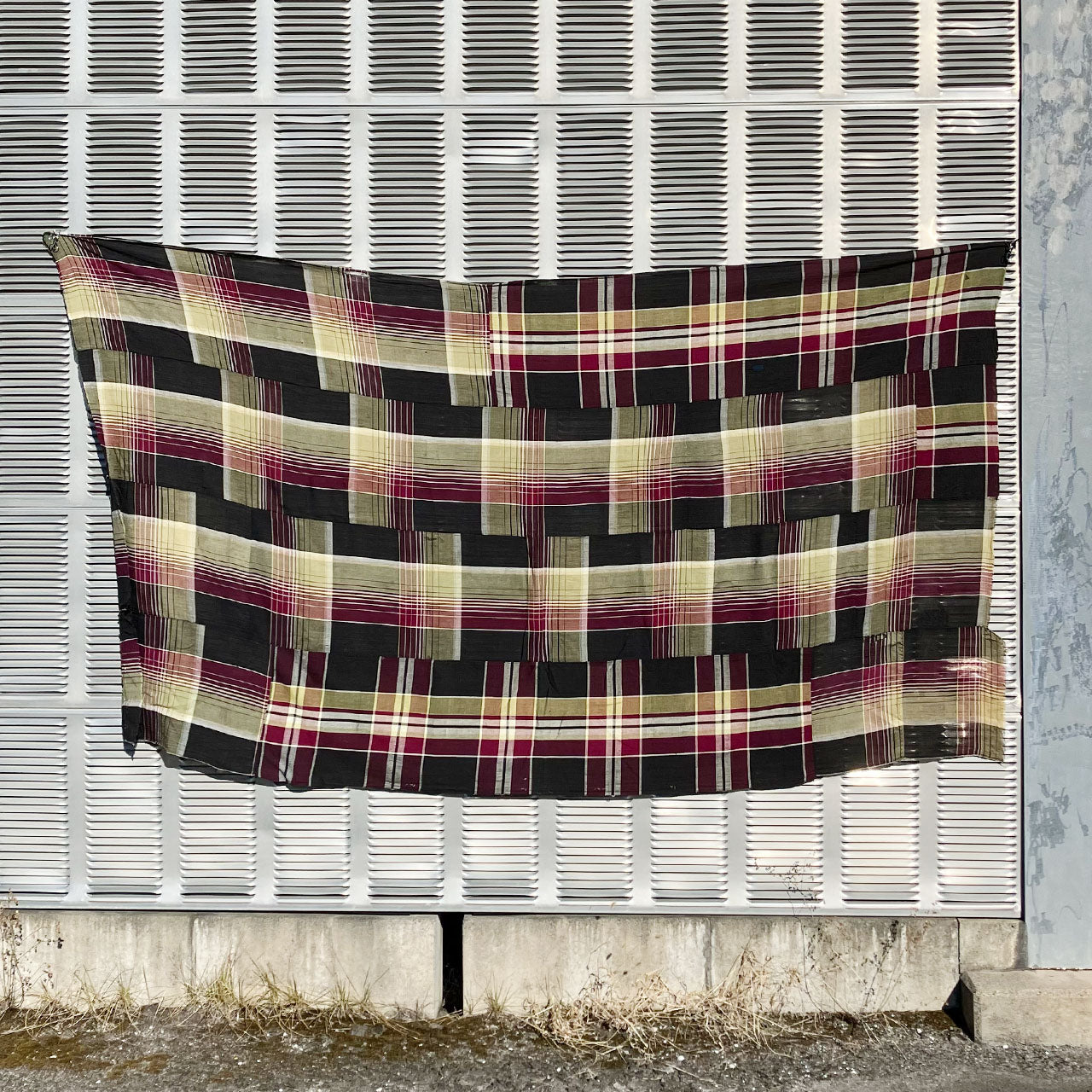 Antique Japanese futon cover textile with natural fading and repairs, reclaimed cotton fabric