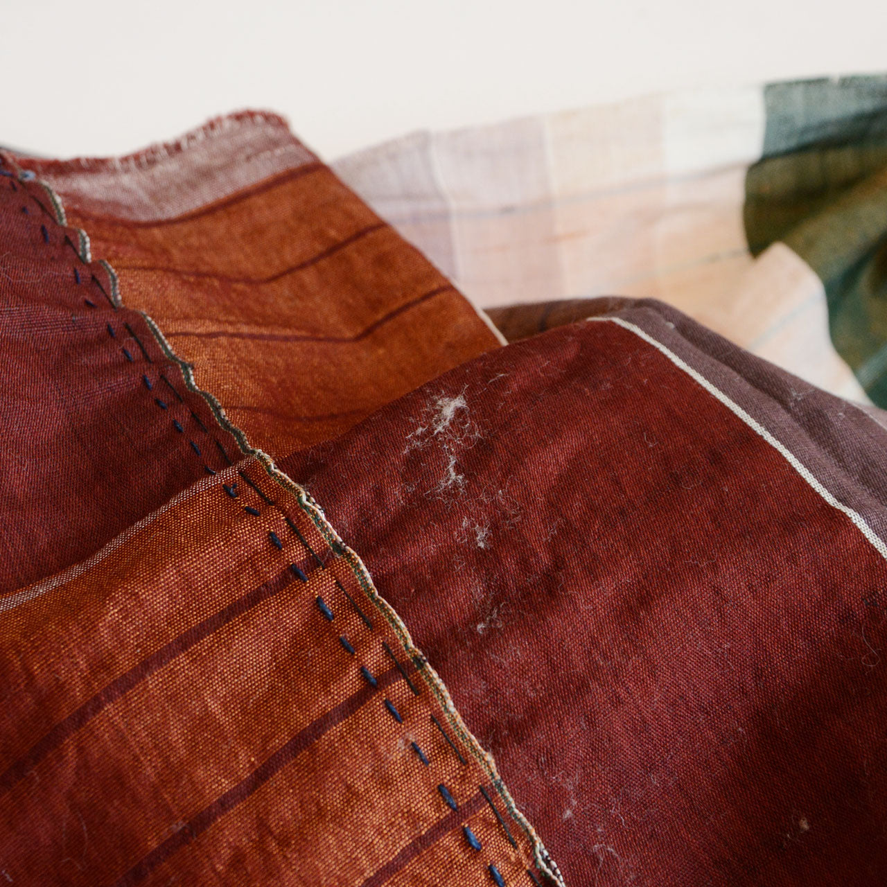 Vintage Japanese cloth with expressive texture and stitching lines