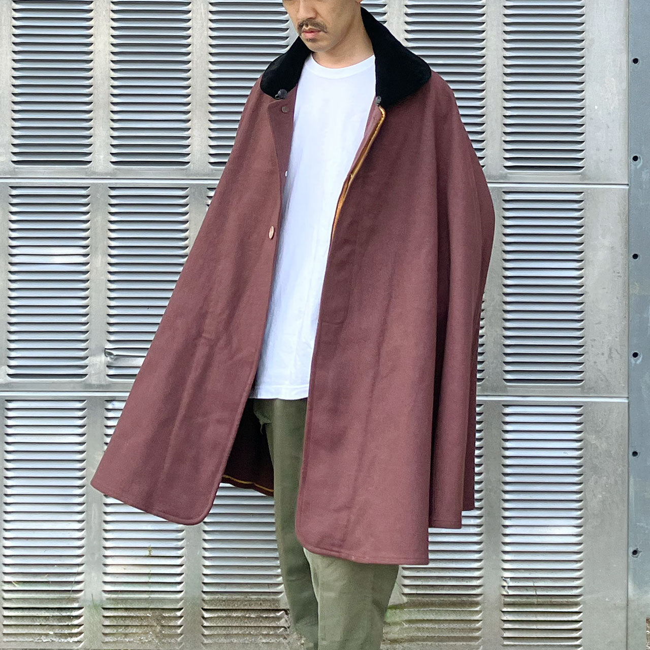 Tonbi-style coat with wide, flowing silhouette