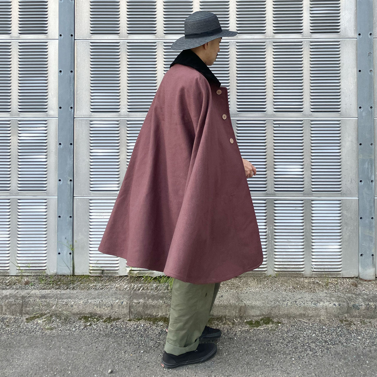 Muted pink Inverness coat with historical significance