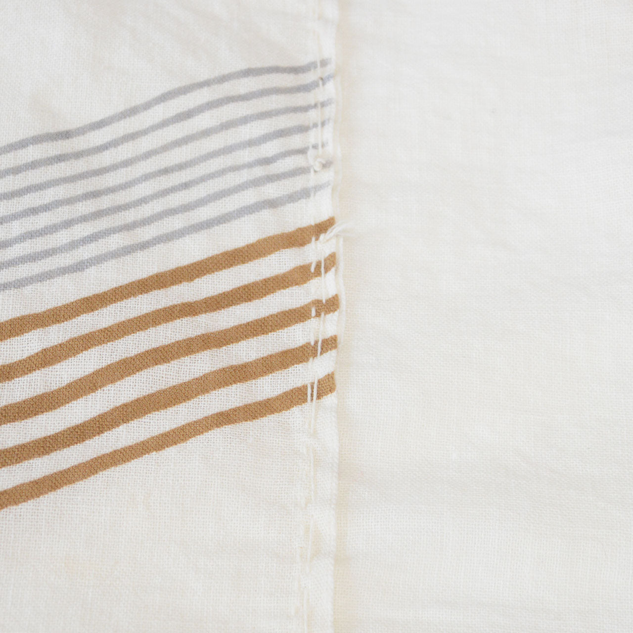 Soft aged cotton textile with subtle color variations