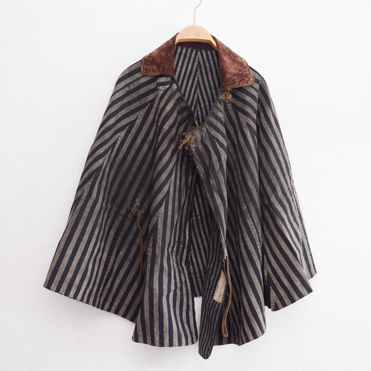 Japanese dochu-kappa travel cape, vertical stripe cotton, brown collar, Taisho to early Showa era, Japan vintage, front view on hanger