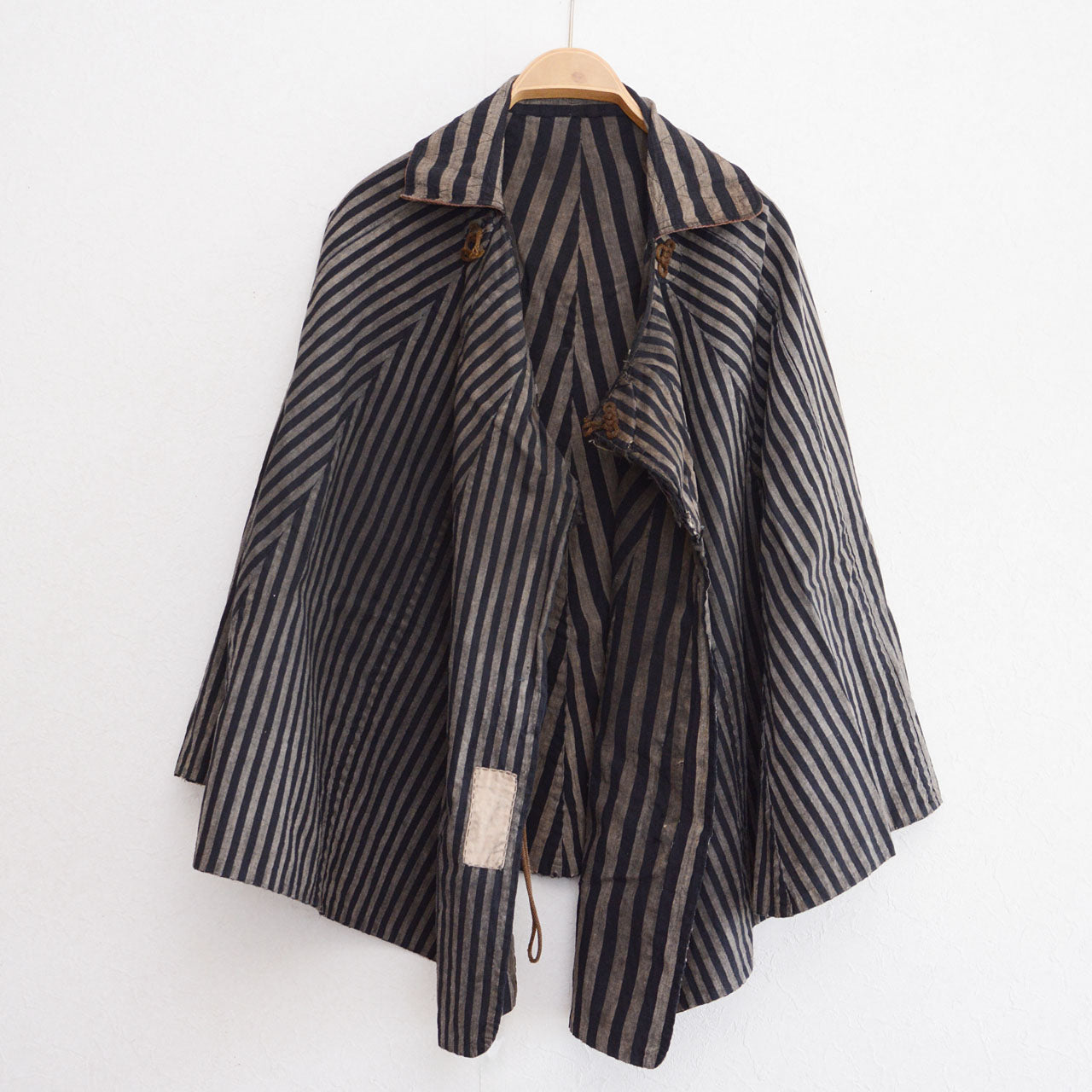 Japanese dochu-kappa travel cape, interior lining, Taisho to early Showa era, Japan vintage, front view on hanger
