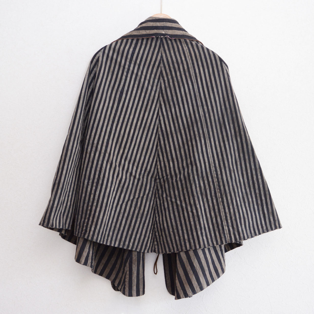 Japanese dochu-kappa travel cape, interior lining, Taisho to early Showa era, Japan vintage, back view on hanger