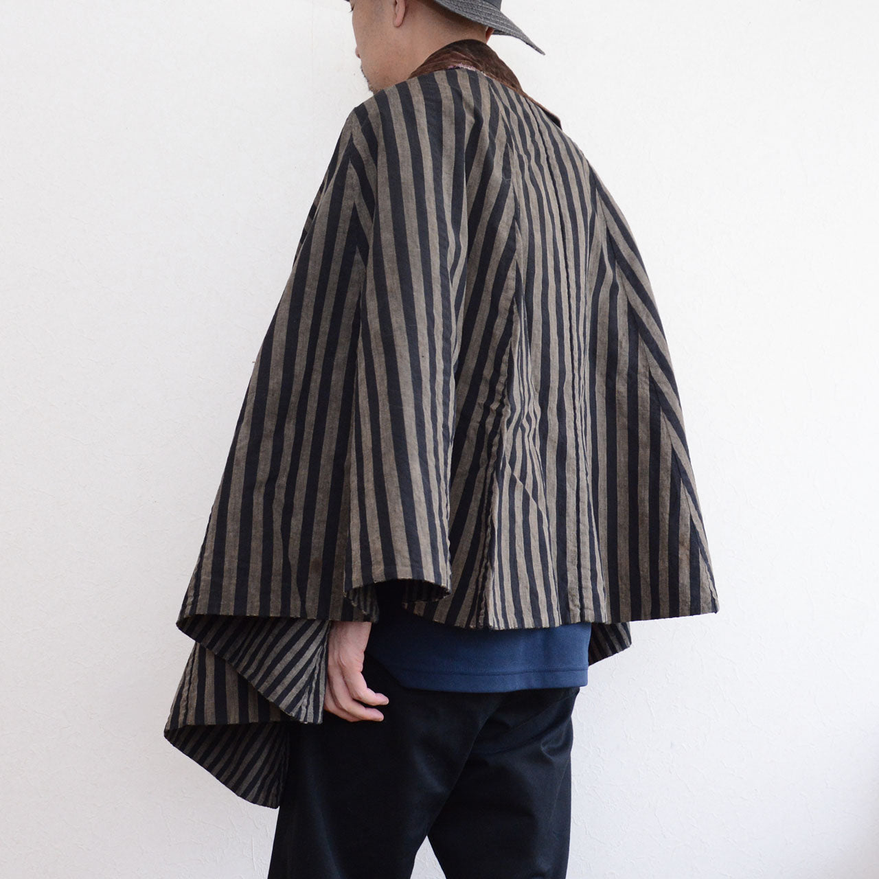 Japanese dochu-kappa travel cape, vertical stripe cotton, full-circle silhouette, styled on model, back view