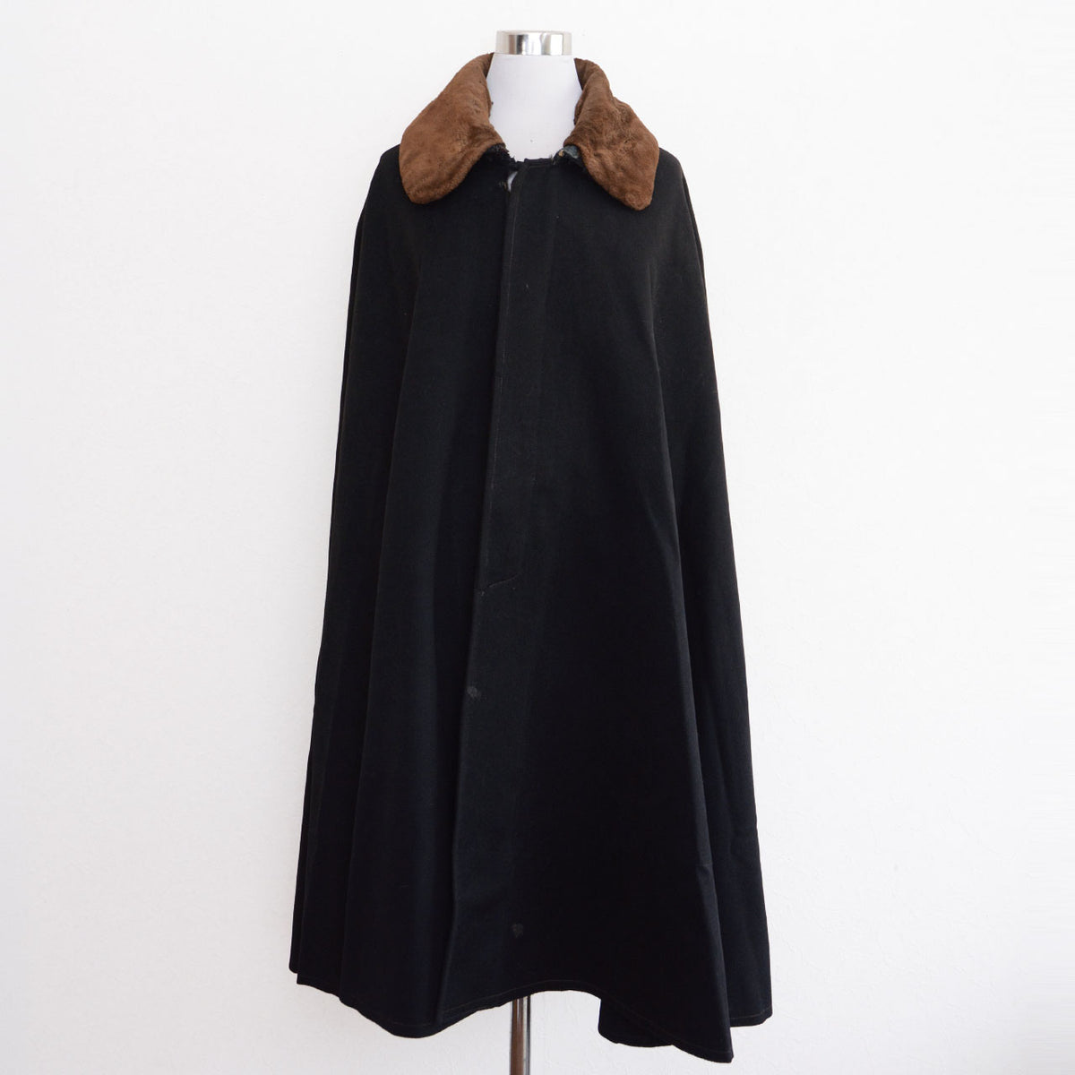 Black Japanese vintage Bankara mantle with brown fur collar on a mannequin.