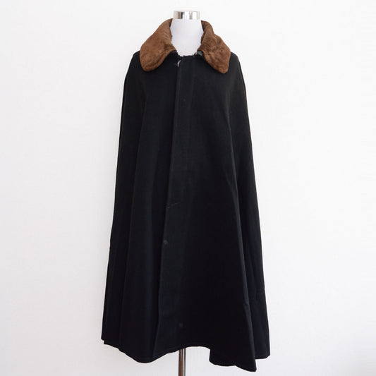Black Japanese vintage Bankara mantle with brown fur collar on a mannequin.