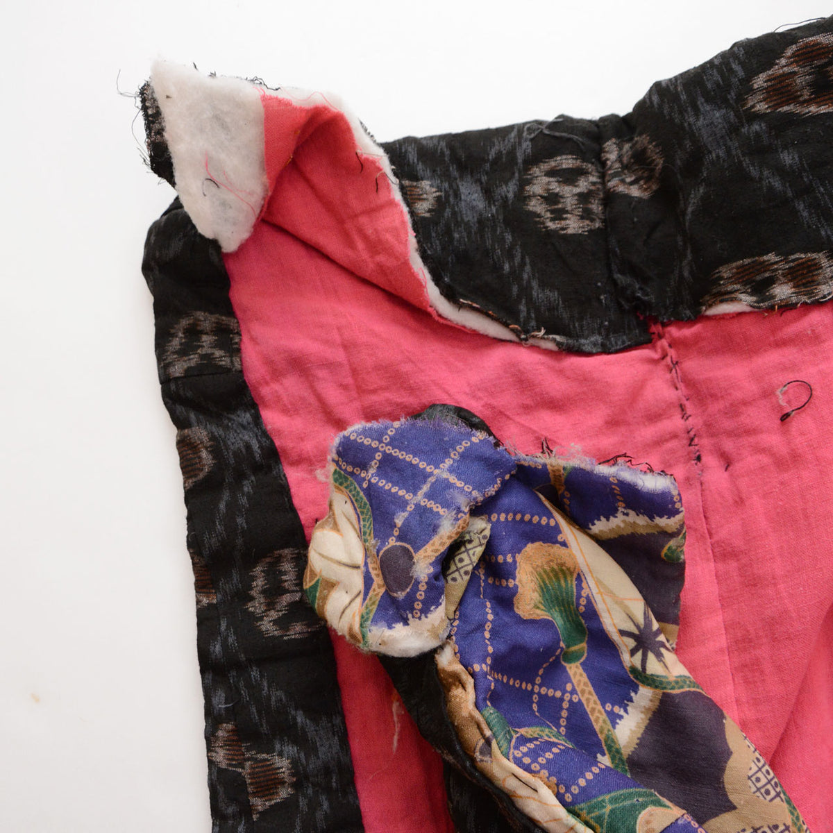 Missing stitches and exposed padding in Japanese vintage cotton textile