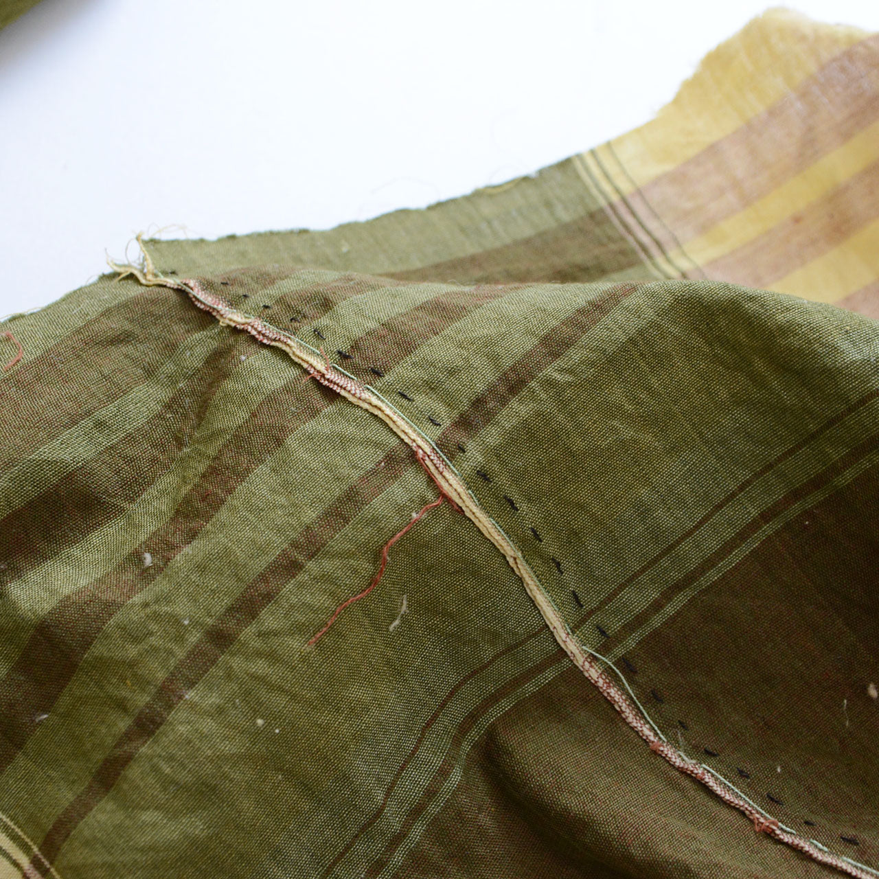 Japanese vintage cotton fabric, rust red and olive green plaid, unstitched Showa-era futon textile, full drape showing both colorways together
