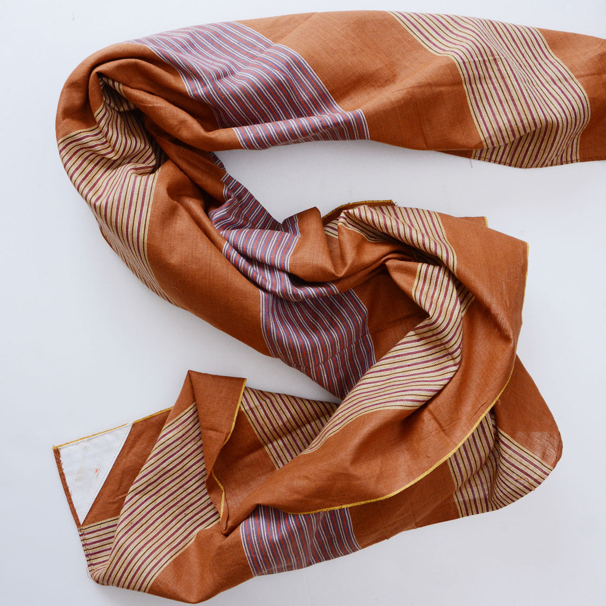 Unused mid-Showa cotton furoshiki with pale and purplish striped bands on a brown ground