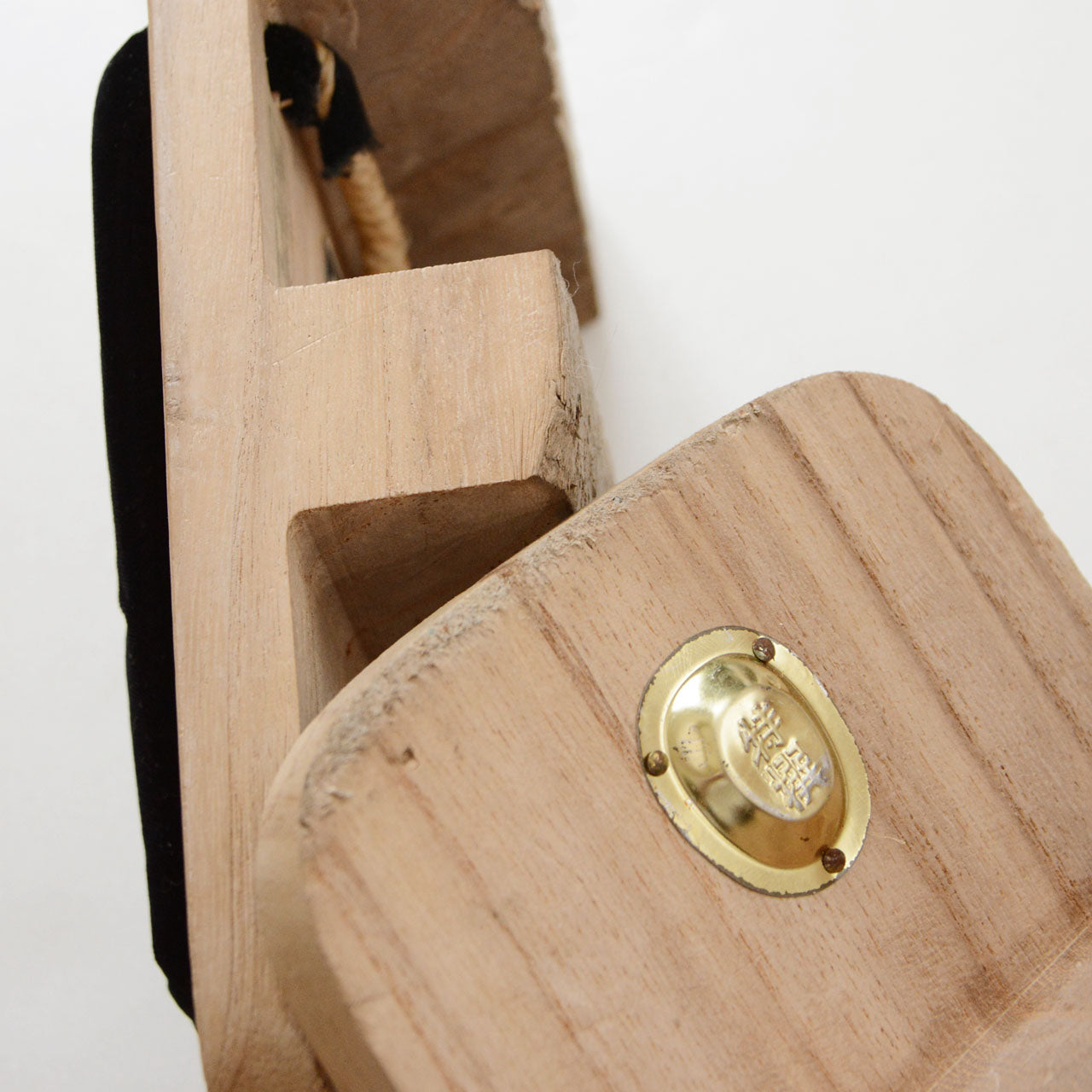 Minor wear on the wooden tooth of vintage Aizu Paulownia geta sandals, consistent with age and use