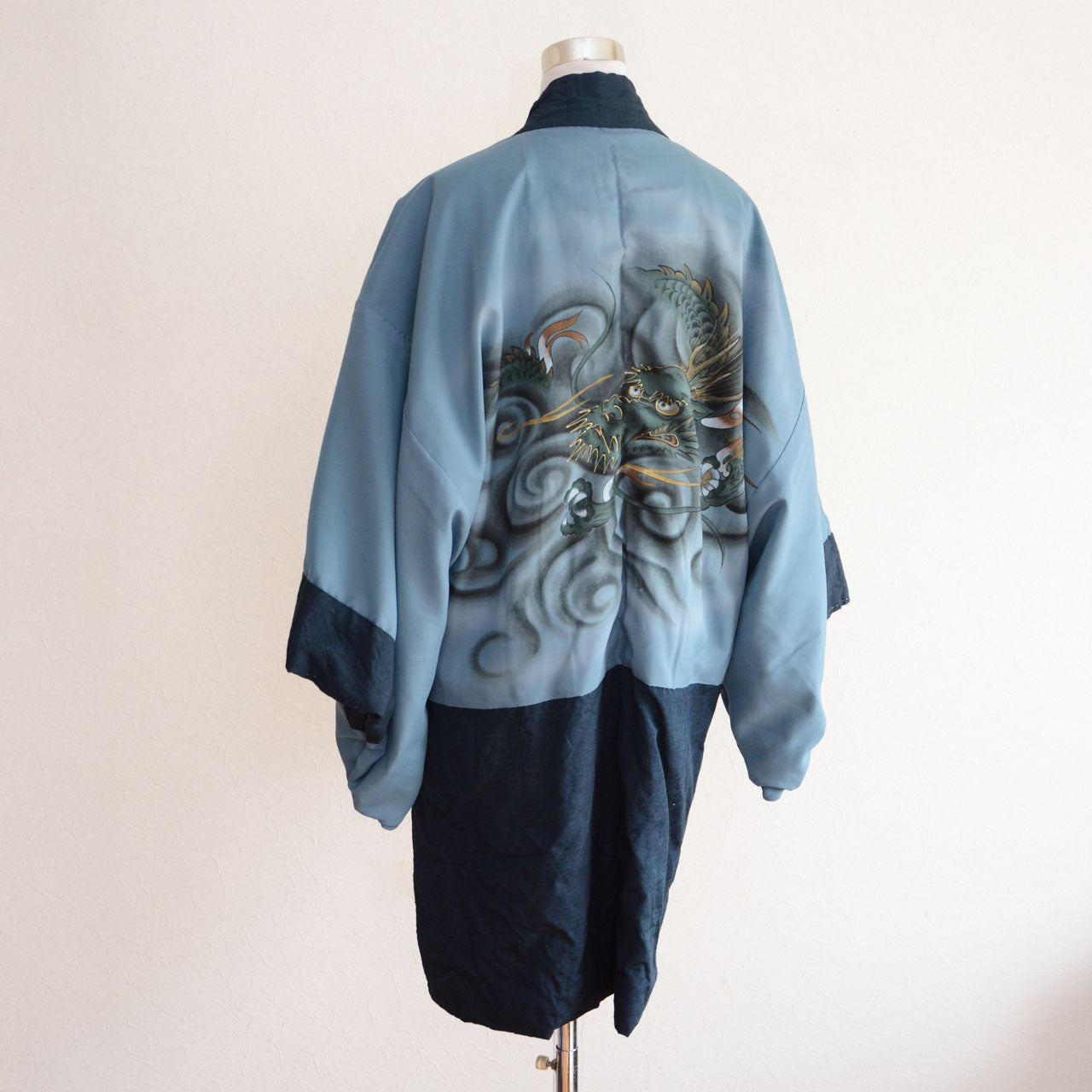 A Japanese garment made from textile featuring a dragon pattern