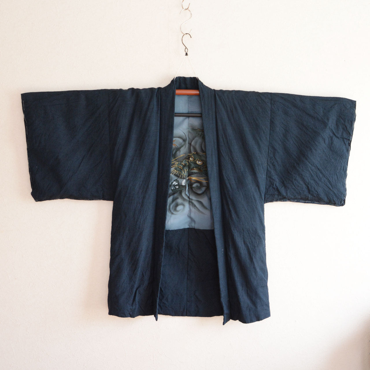 A traditional Japanese garment featuring dragon motif textile