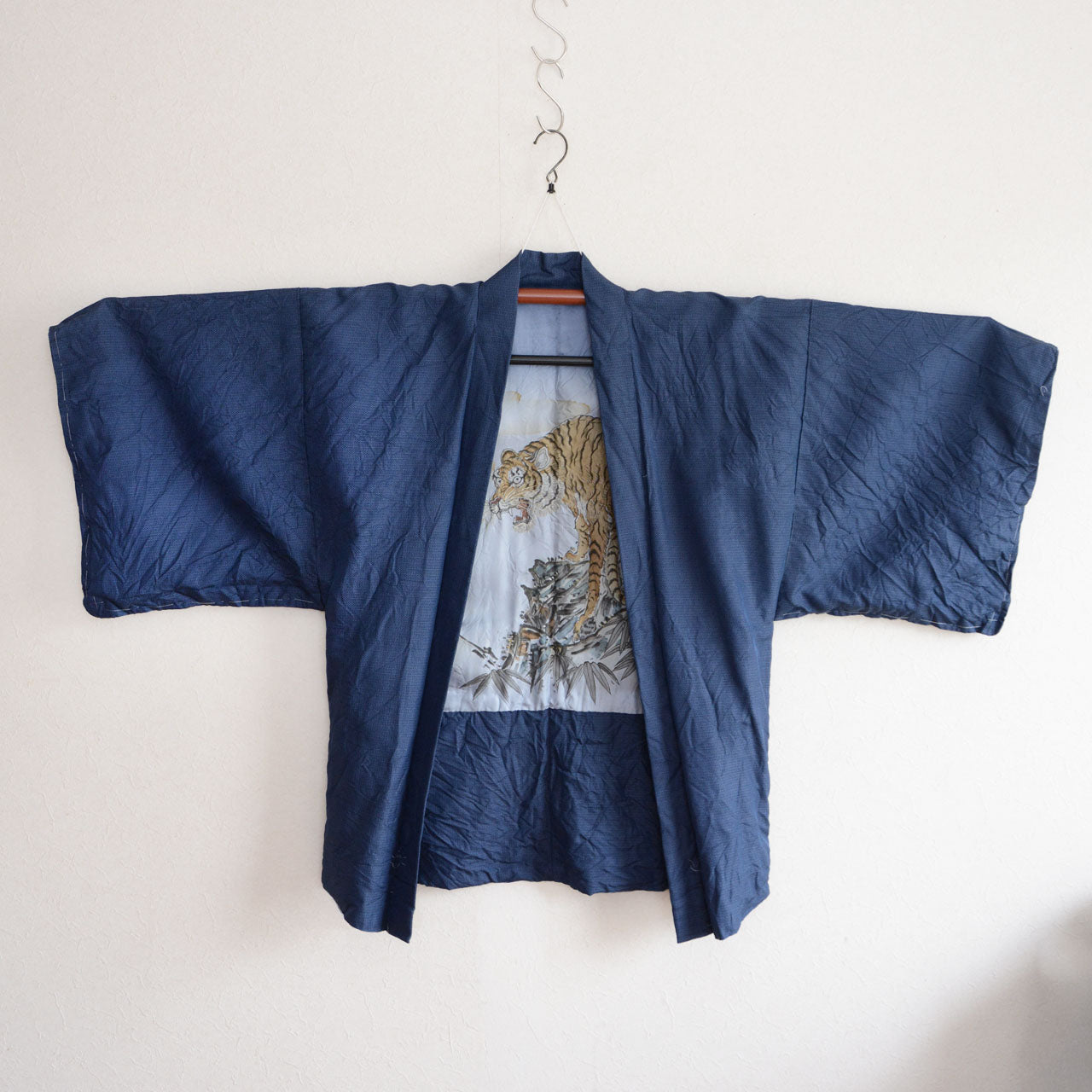 Traditional Japanese haori jacket featuring a tiger motif lining