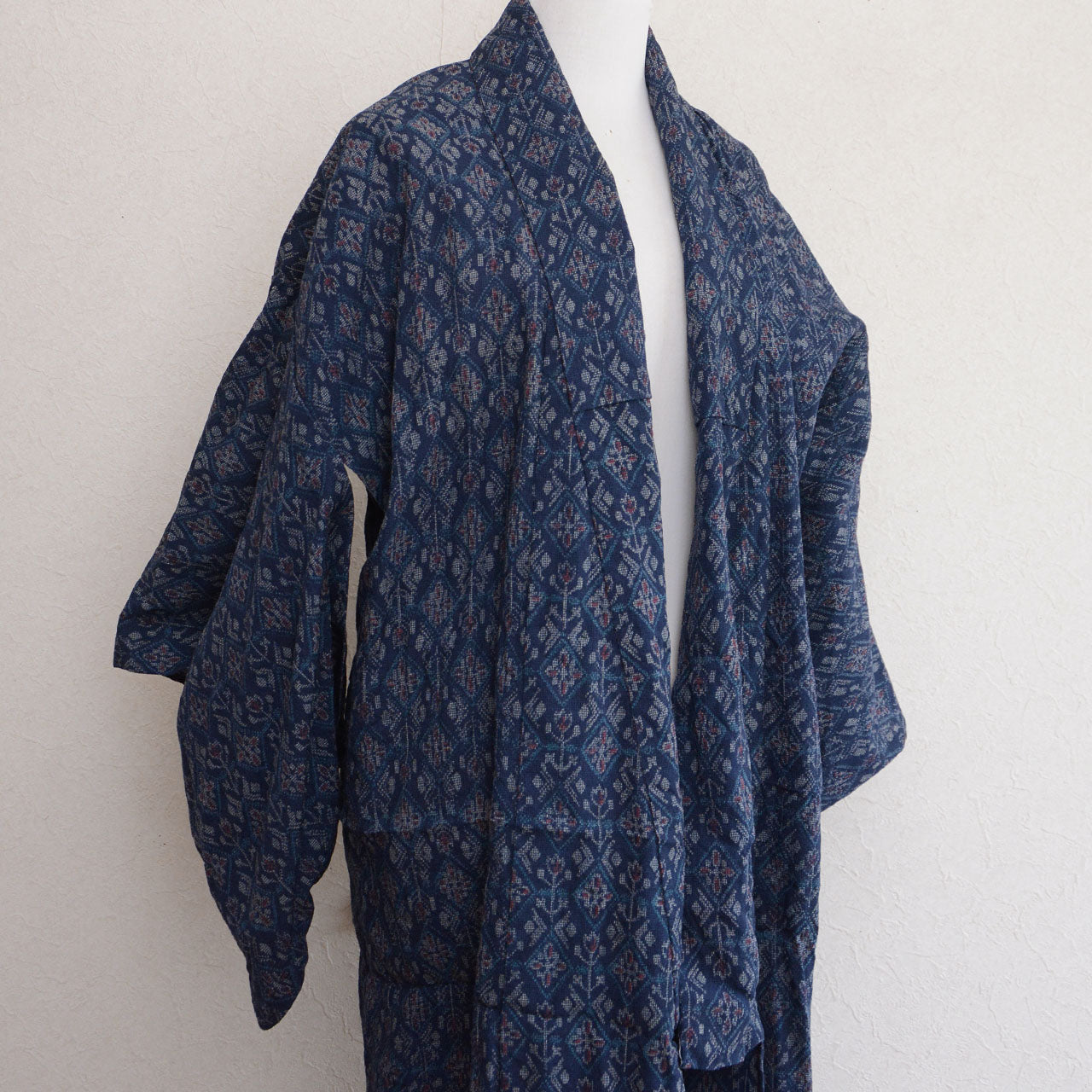 Wide collar of a kimono with the snap buttons fastened