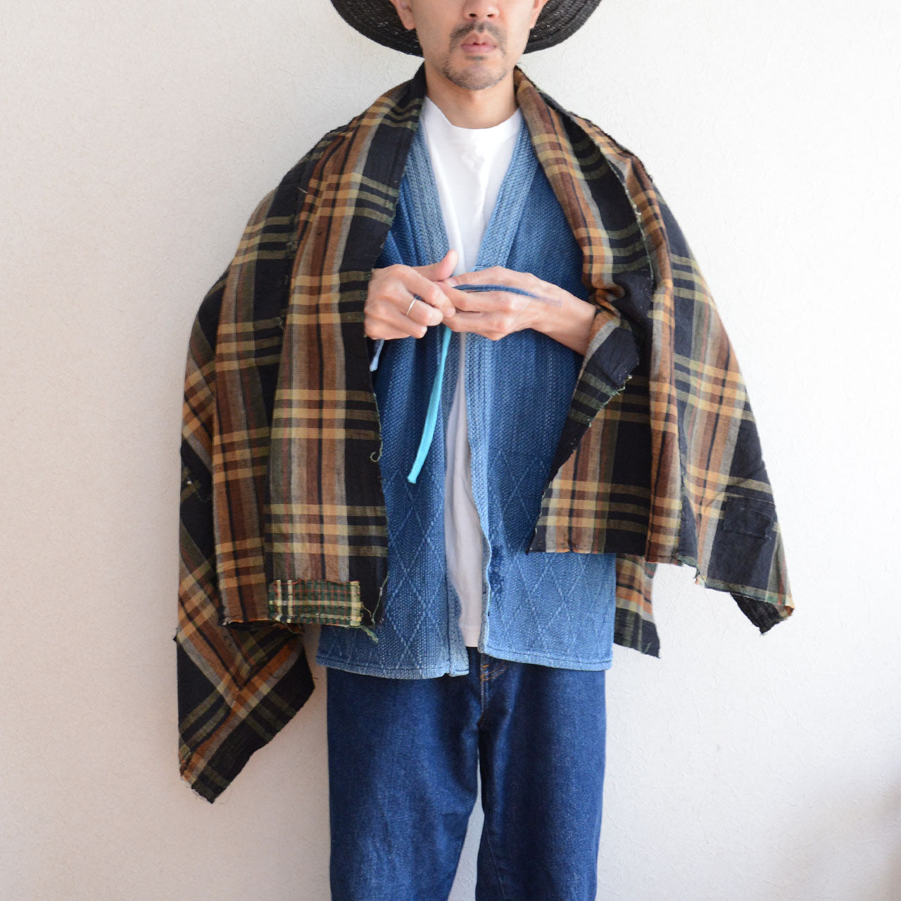 Full-length shot showing natural wear, fading, and sashiko details
