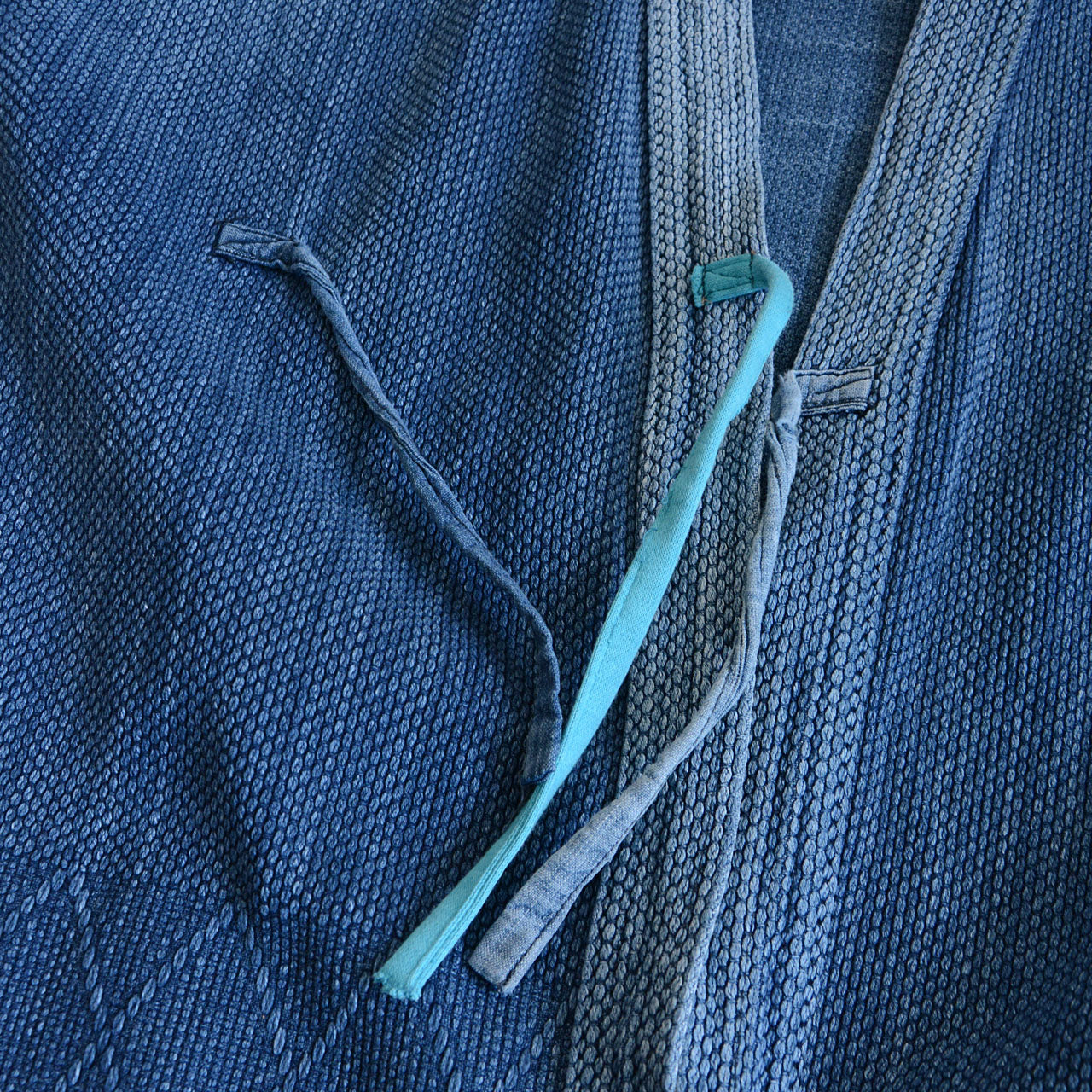 sashiko stitching and faded indigo texture