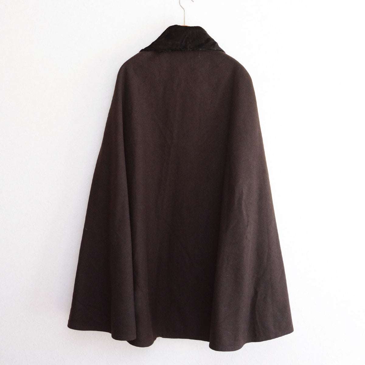 Dark brown Japanese vintage mantle with a flared silhouette and black collar
