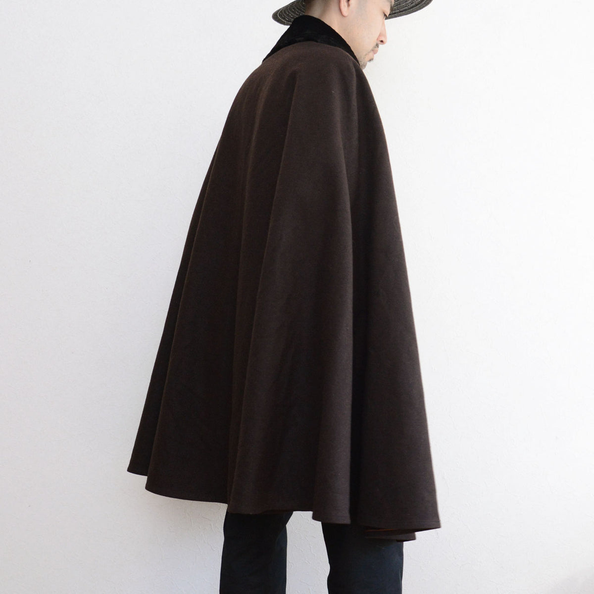 Dark brown Japanese vintage mantle with flowing fabric and a black collar