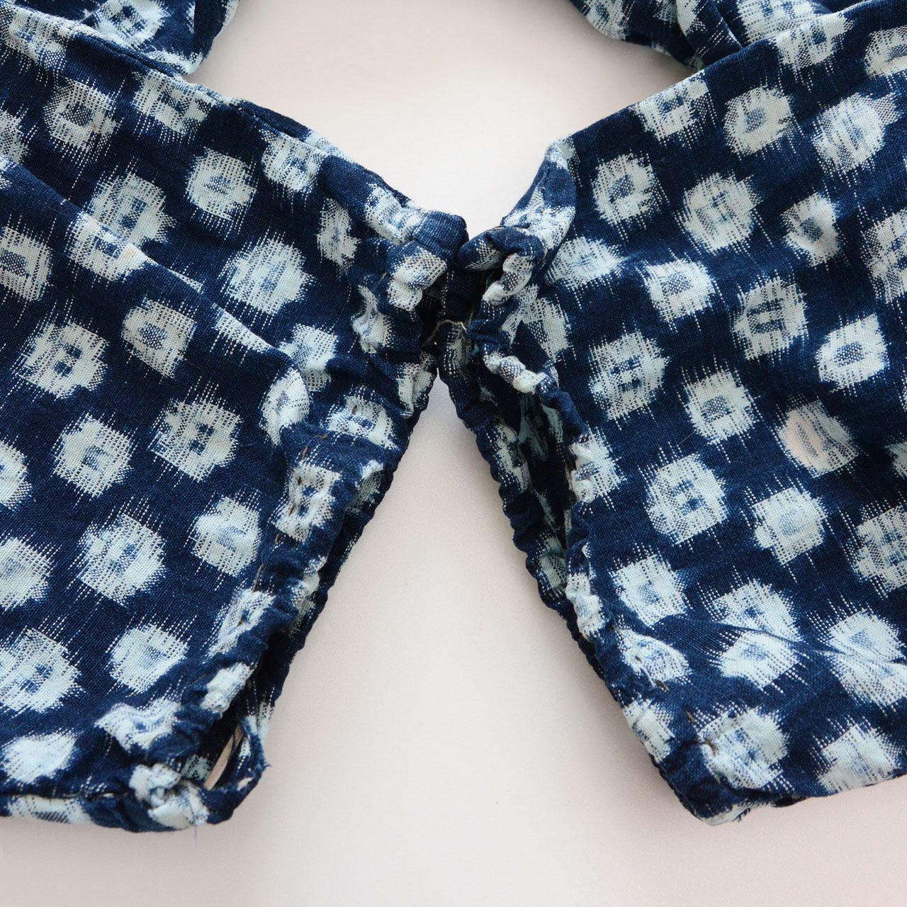 Aged indigo kasuri cotton monpe, visible patina and boro character, Japan vintage