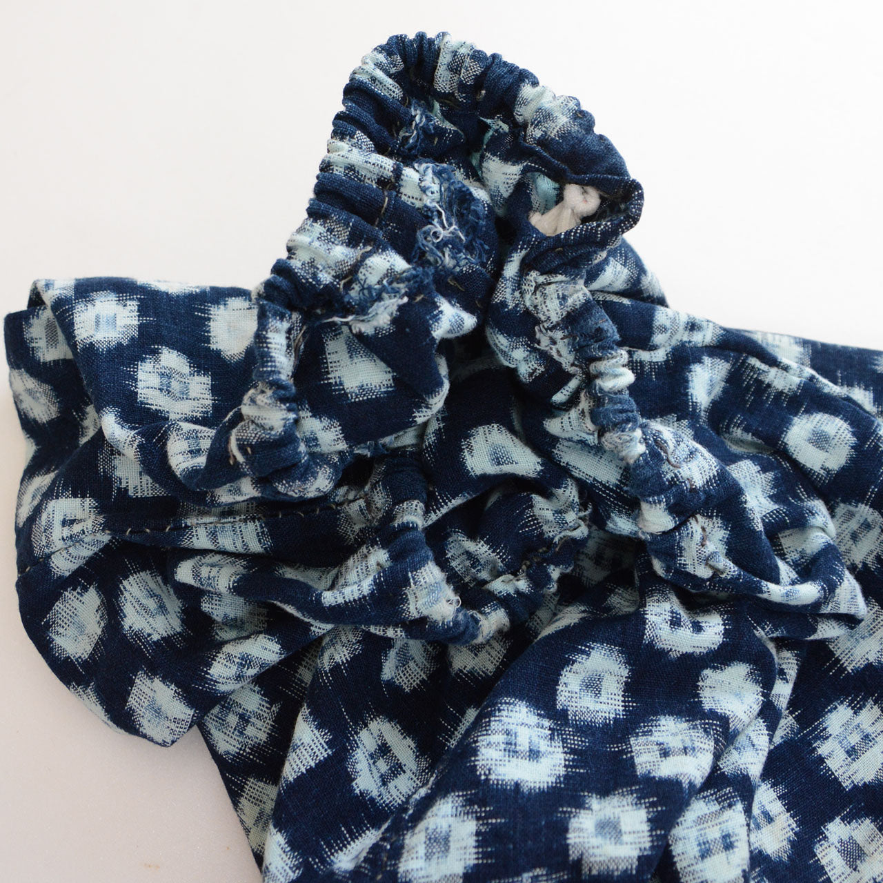 Showa-era monpe in hand-stitched kasuri cotton, indigo and natural tones