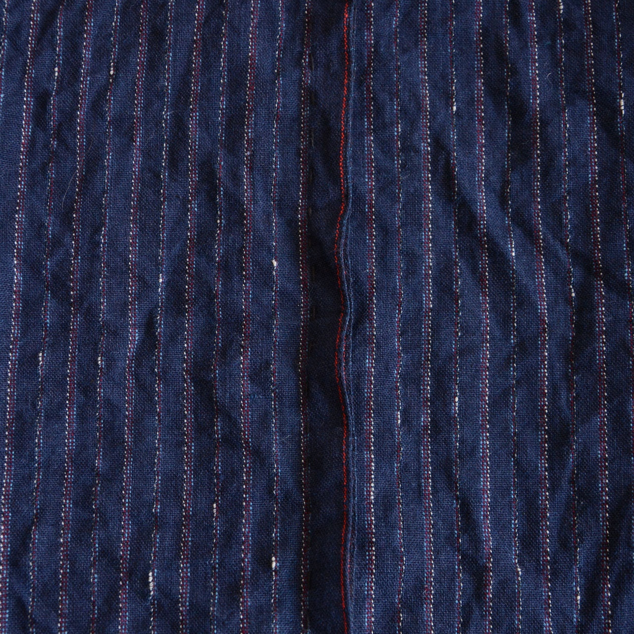 Short Japanese workwear jacket highlighting traditional craftsmanship.