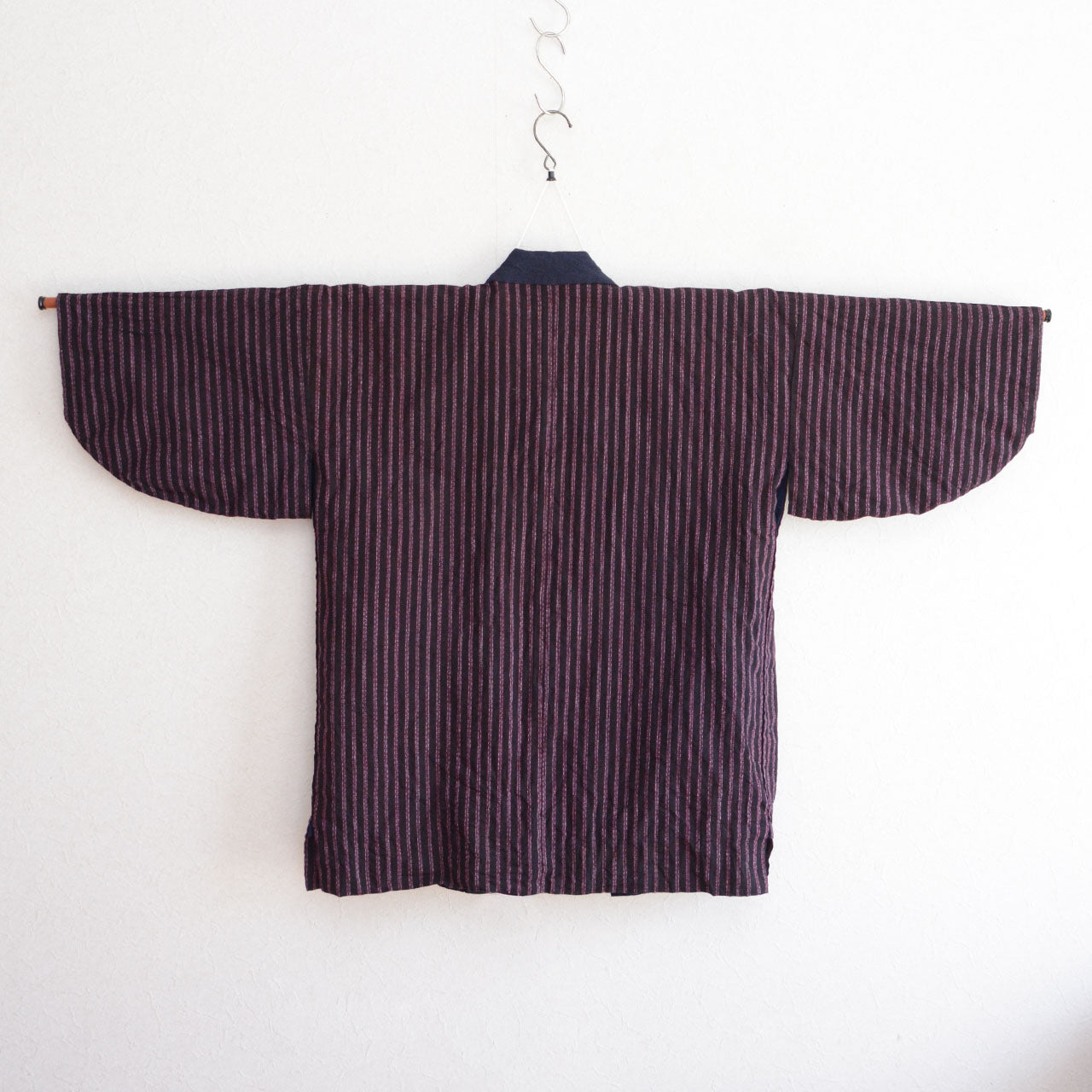 A historic Japanese garment representing practical clothing values from the early modern period.