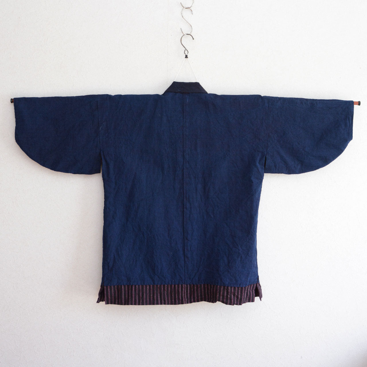 A traditional Japanese garment associated with rural life and everyday labor.