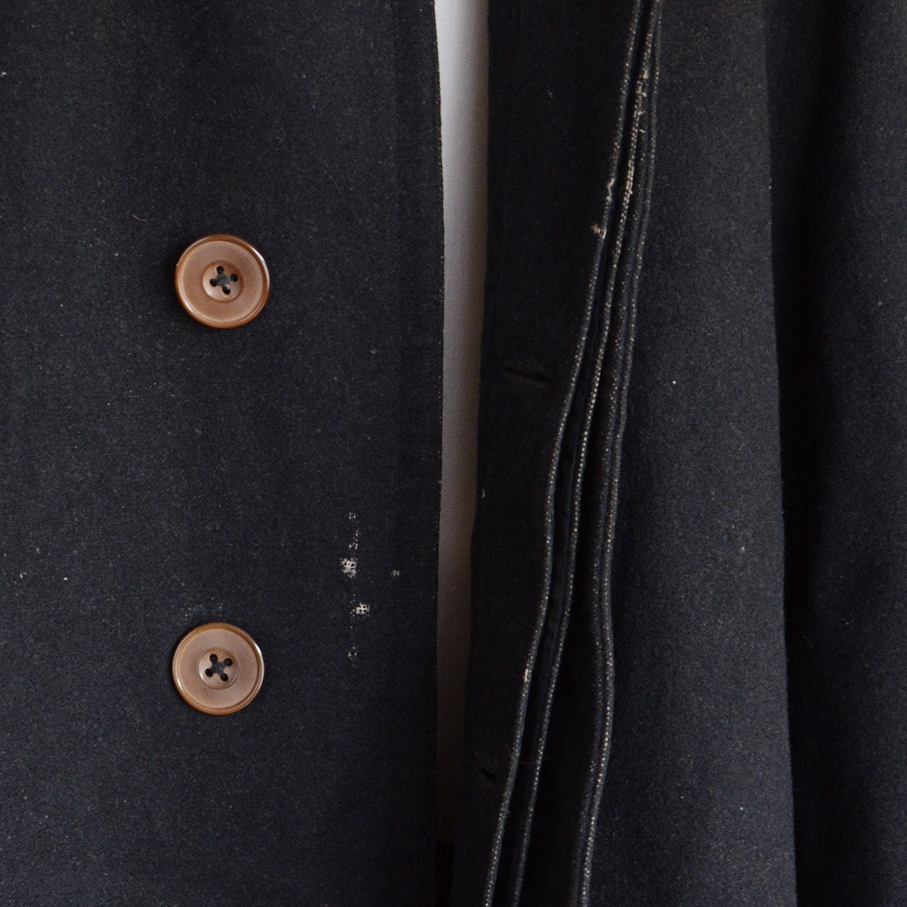 Early Japanese adaptation of European outerwear seen in tonbi mantle designs