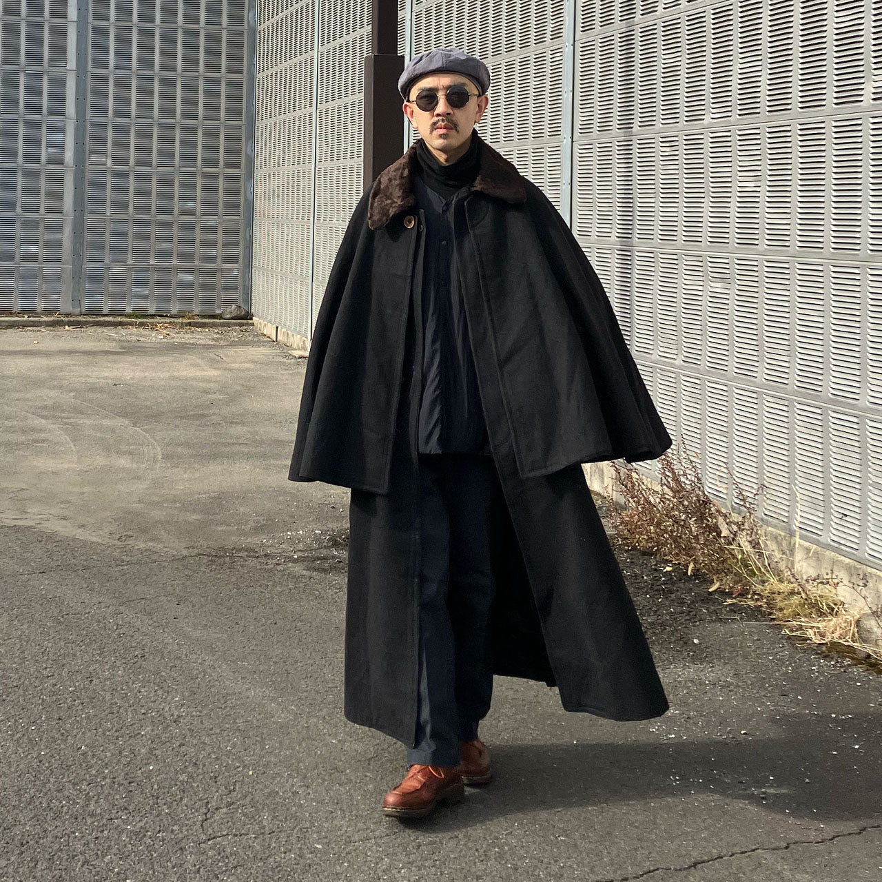 Early 1900s Japanese vintage mantle coat with a sophisticated black wool finish