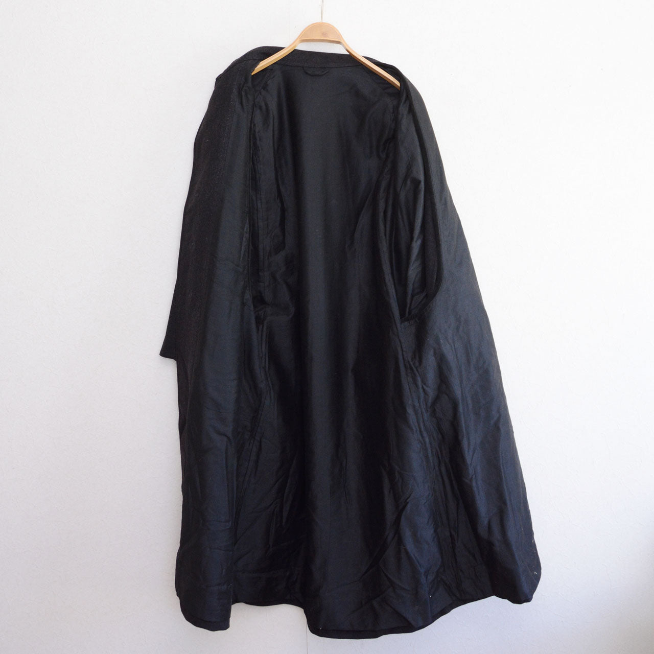 Japanese antique tonbi coat detail, dark charcoal wool fabric, Taisho Showa era, inverness style, no fur collar