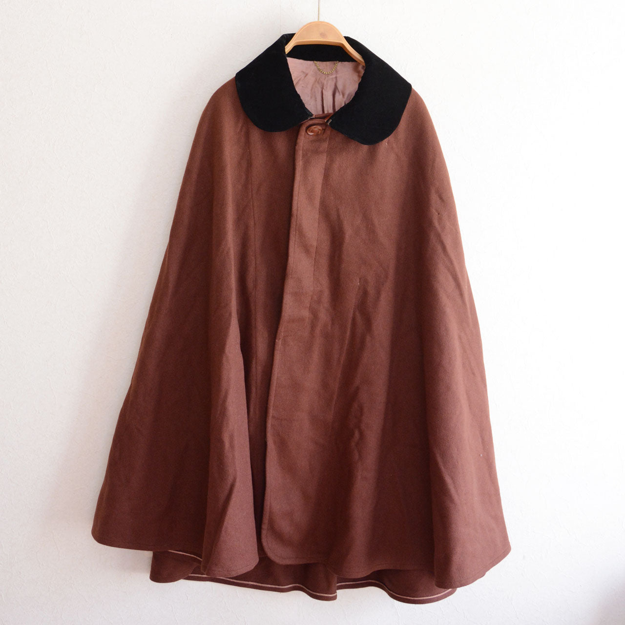 Vintage Japanese wool mantle showcasing elegant drape and understated historical character