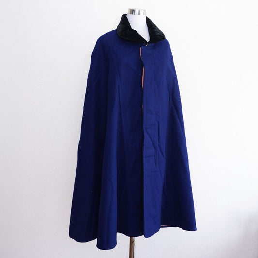 Deadstock Japanese vintage wool cape in royal blue with velvet collar, mid-Showa era, full-length flared silhouette, metal hook-and-eye closure