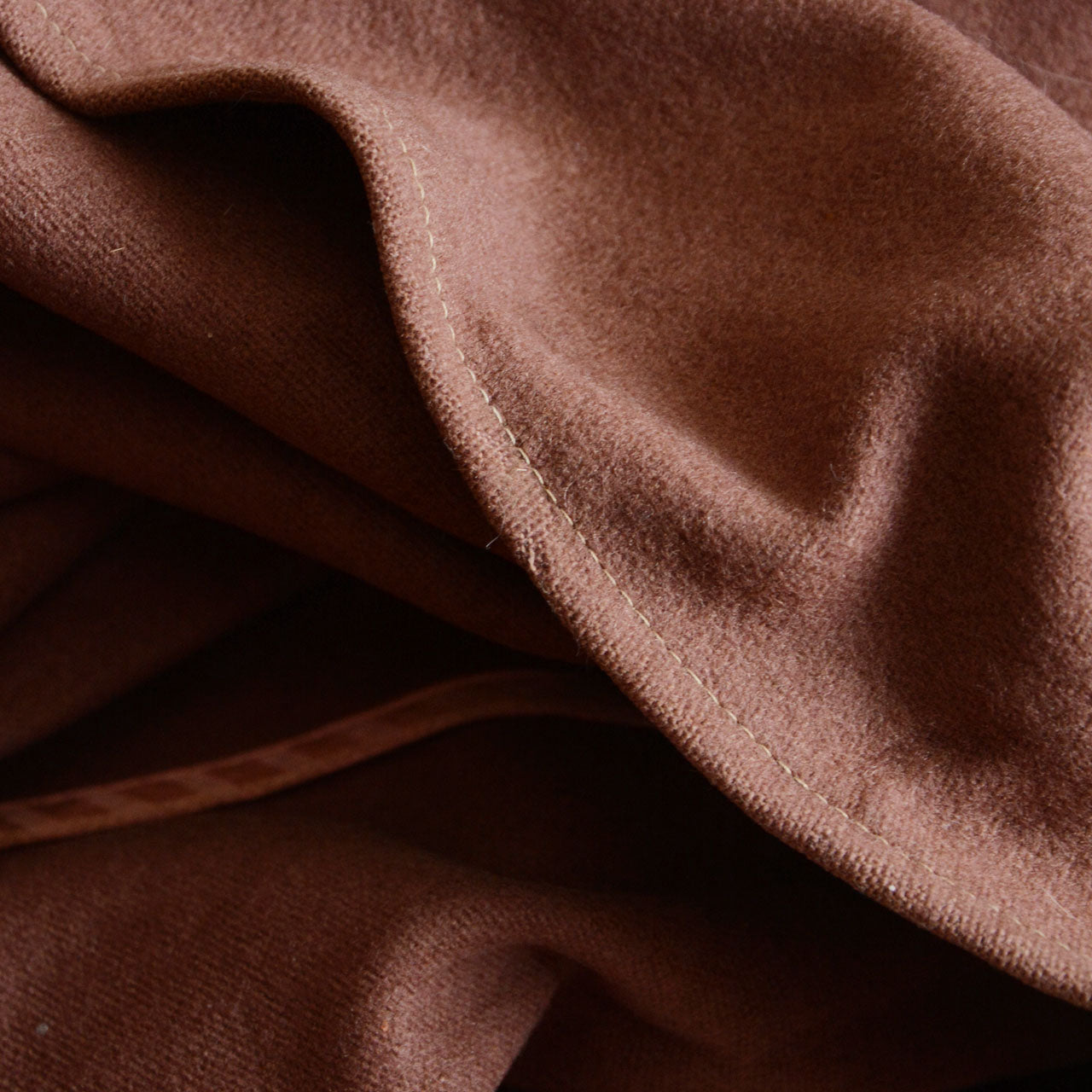 Japanese vintage cape mantle emphasizing movement, texture, and historical atmosphere