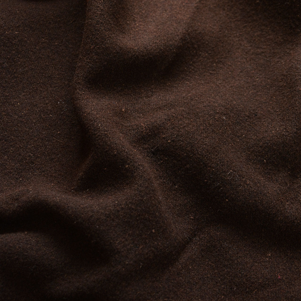 Close detail of brown wool fabric on Japanese vintage mantle