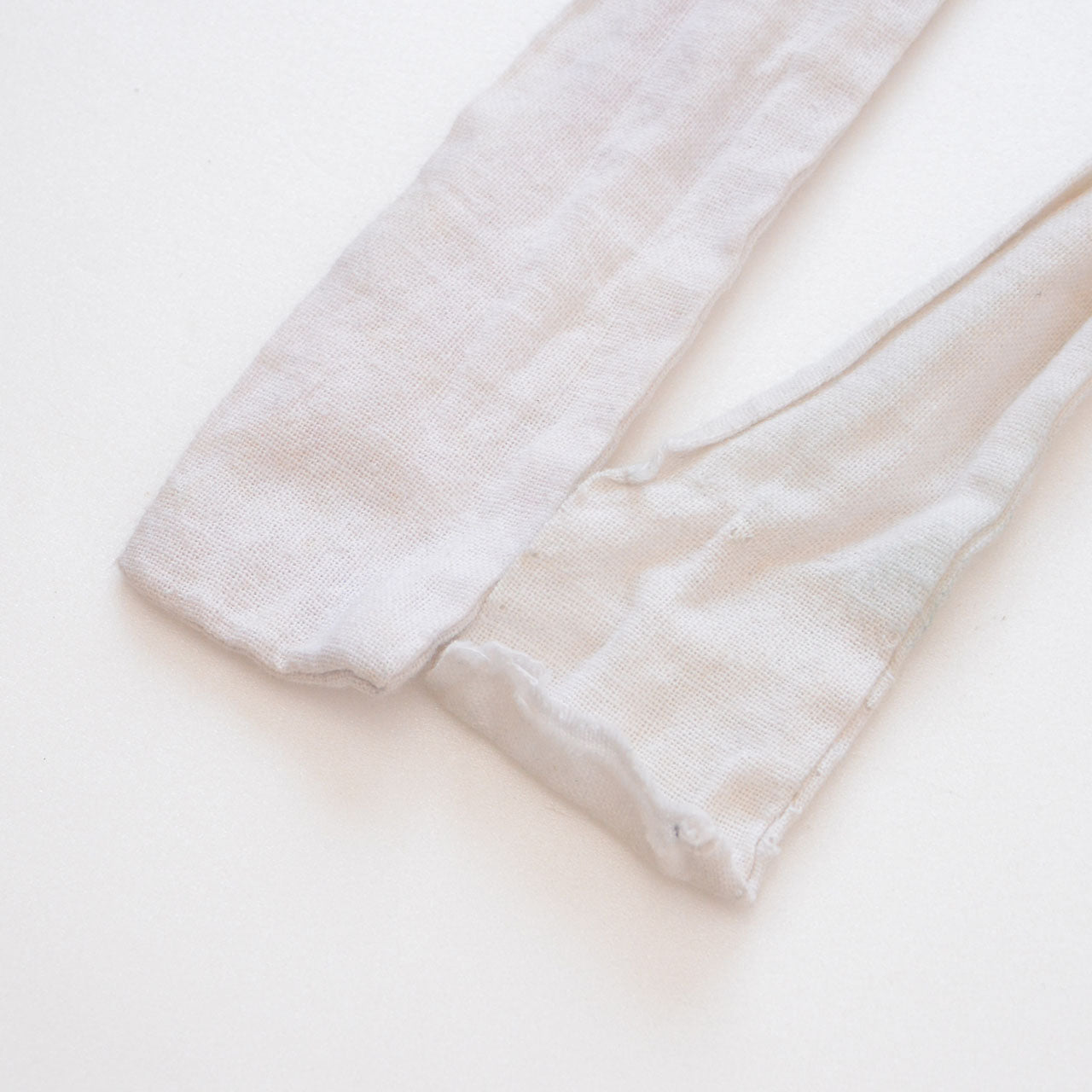 Vintage fabric strip adding texture to casual clothing