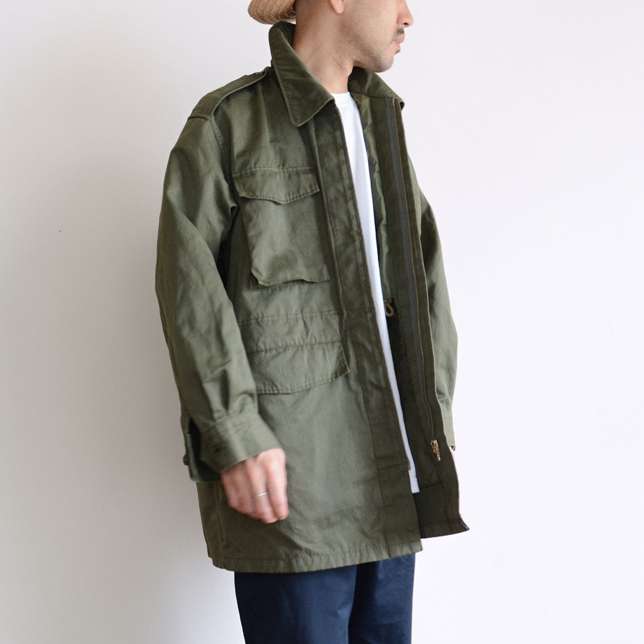 Versatile military jacket suitable for layering over shirts