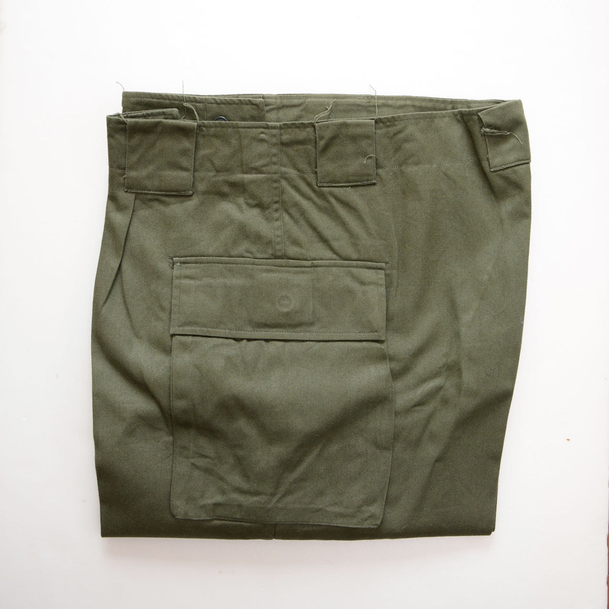 JGSDF Type 65 work trousers in OD olive drab, folded with cargo pocket construction