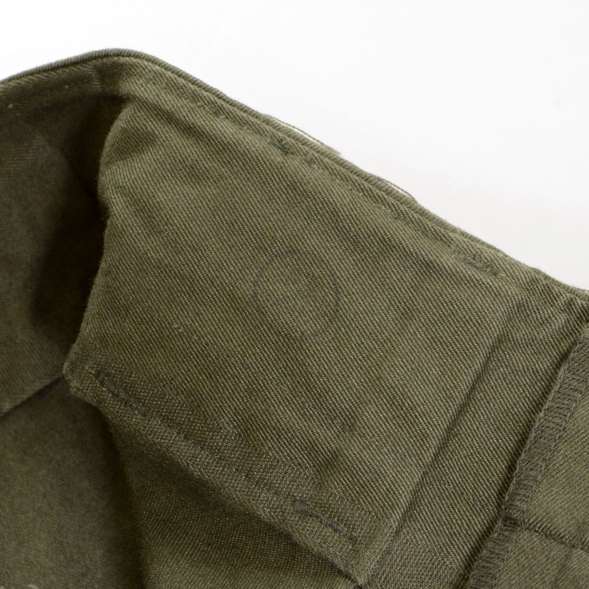 Interior of JGSDF Type 65 work trousers showing a faded size stamp