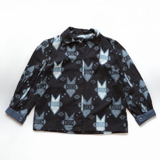Kasuri ikat cotton shirt, flat lay front — geometric arrow and diamond pattern, handmade Japan vintage mid-Showa